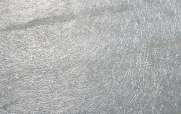 Hade Edge laminate fibreglass or shingles?